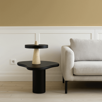 mesita auxiliar negra de piedra para decorar interiores contemporáneos